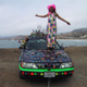 Illustration for article titled Groovalicious Purple Princess Of Peace Art Car Falls On Hard Times, Faces Crusher